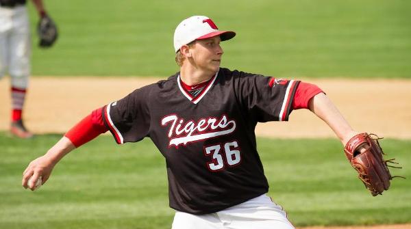 Mike Burgher and the Tigers were held to two hits in a 12-0 loss to Capital. File Photo | Erin Pence