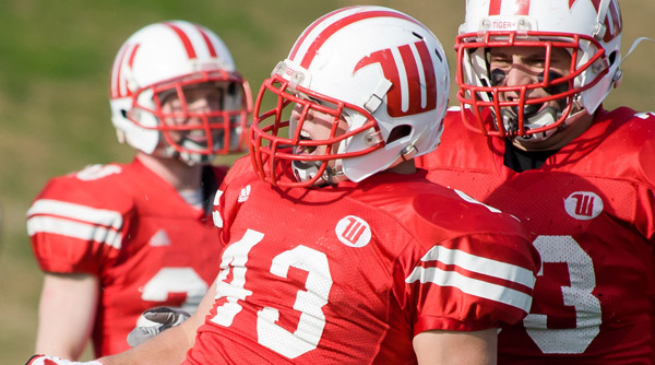 Evan Killilea (43) led the Tigers with nine tackles and a sack as Wittenberg opened with a 44-17 victory over Capital. File Photo | Erin Pence
