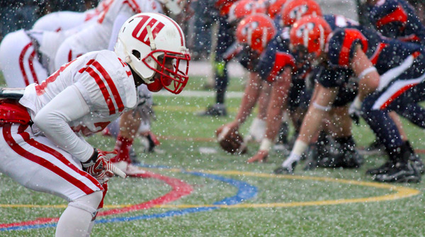 Karlos Marshall (21) and the Tigers fought snow and freezing temperatures in a 35-10 loss at Hobart in the second round of the NCAA Division III Tournament. Photo by Russell Kramer/NCAC