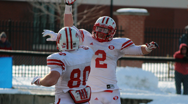 Jimmy Dehnke and Brendon Cunningham celebrate the Tigers' third touchdown against Mount Union. Photo by Russell Kramer, NCAC