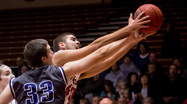 Junior Alex Fultz hauled in nine rebounds for the Tigers in a loss to Capital on Tuesday. File Photo | Erin Pence '04