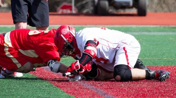 Ryan Spitzer won 11 of his 18 face-offs to spark the Tigers to an 11-8 victory over Otterbein. Photo by Erin Pence