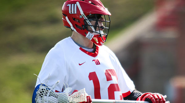 TJ Smith scored three goals in an 11-8 loss at Otterbein. File Photo | Erin Pence