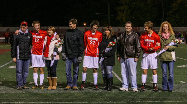 Kevin Bond, Zach White and Tim Weissman celebrated Senior Recognition Night with their parents before a 1-0 win over Allegheny. Photo by Erin Pence