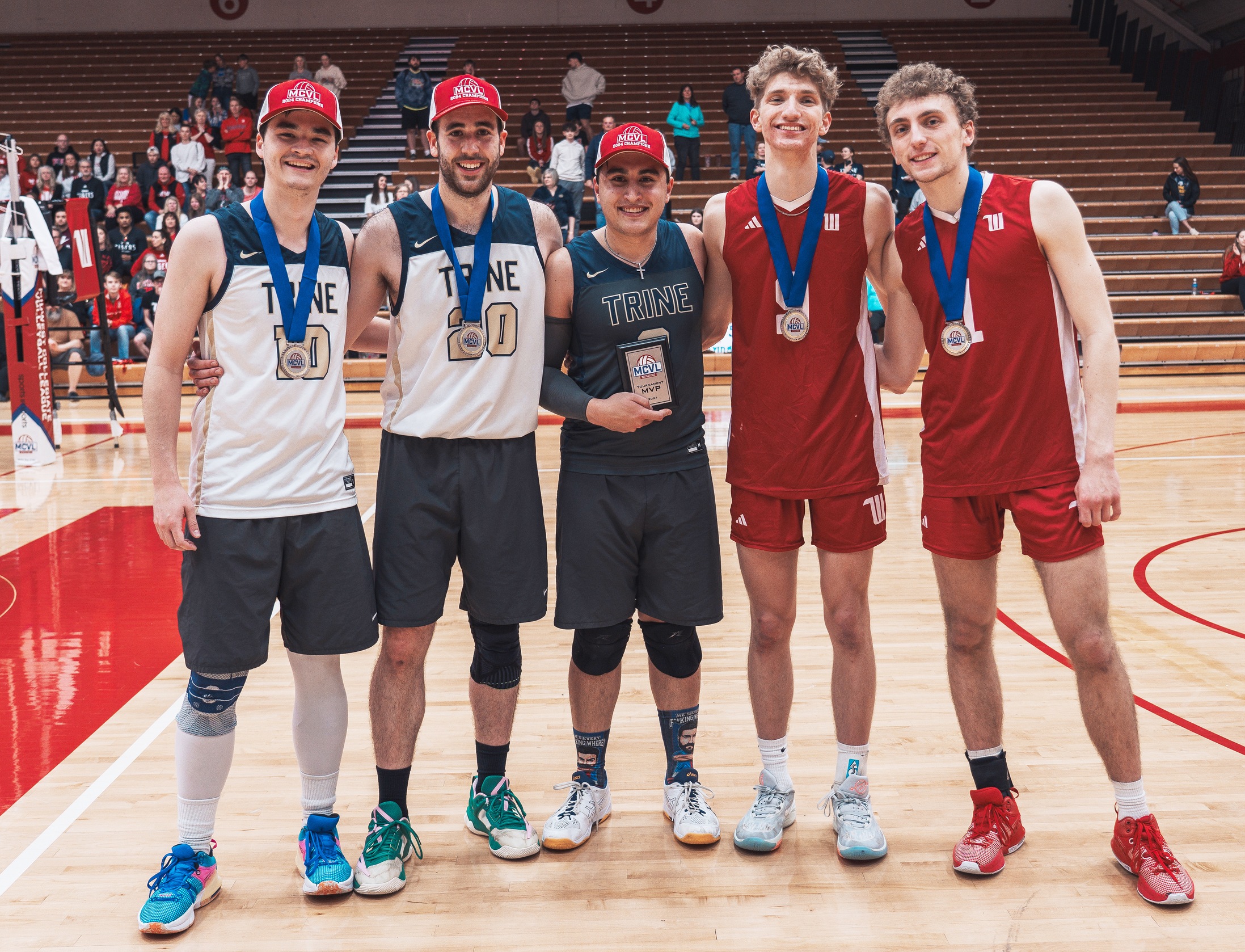Wittenberg sophomores Michael Yurk (second from right) and Eli Halverson (far right) were named to the MCVL All-Tournament Team following the Tigers' runner-up finish. | Photo by Darin Yrigoyen