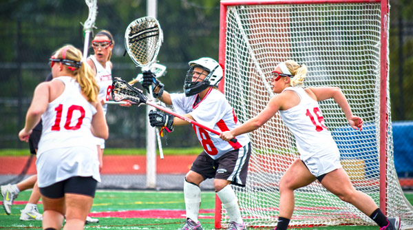 The Wittenberg defense was locked in for Monday's game, including (left to right) Mary Ann White, Alie Marousek, goalkeeper Katie Reuter and Katie Warner. Photo by Erin Pence