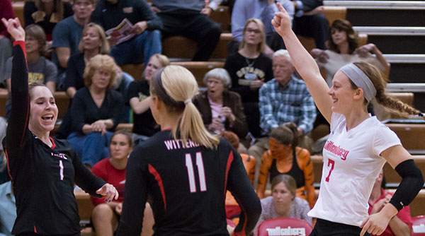 Kiah Murray (7) led the Tigers with 23 digs and Courtney Huck (1) led in assists with 22 as Wittenberg topped Trinity 3-2. File Photo | Erin Pence
