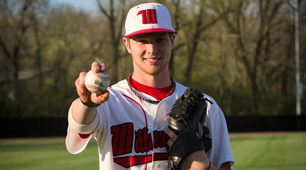Zach Finke holds the game ball from his no-hitter of Ohio Wesleyan on Sunday, the Tigers' first in 15 years. Photo by Erin Pence