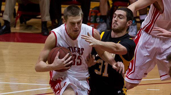 Shane Edwards and the Tigers pulled out a much-needed overtime win over DePauw. Photo by Erin Pence