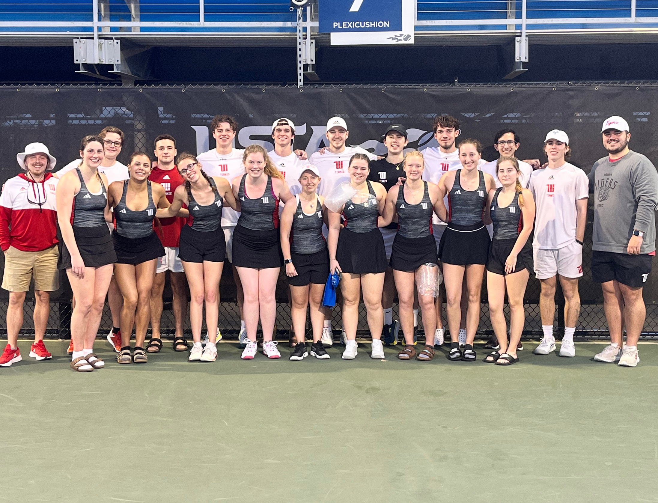 Wittenberg men's and women's tennis student-athletes and coaches gather at the USTA National Campus in Orlando.